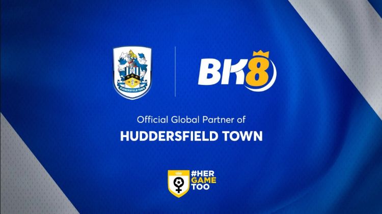 Bk8-hop-tac-CLB-Huddersfield-town